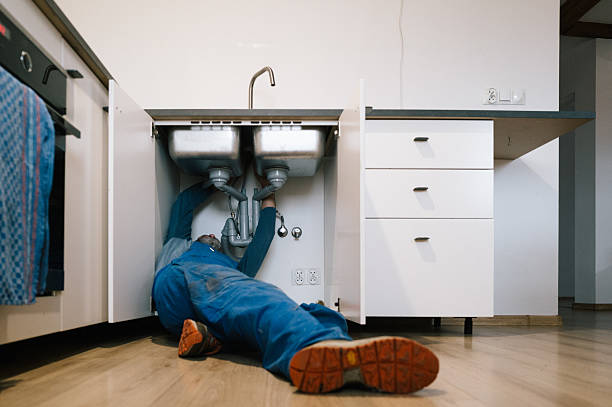 Professional Drain Cleaning technician working in Benham, KY